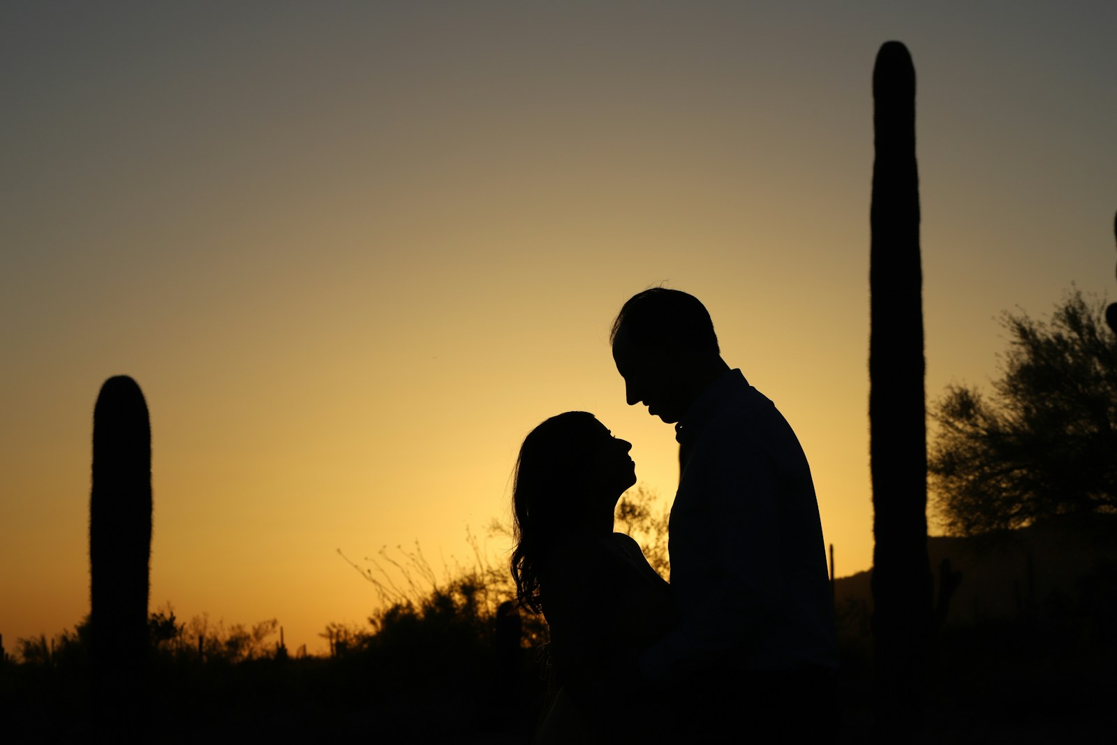 a man and woman kissing
